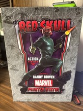 Statua dipinta teschio rosso