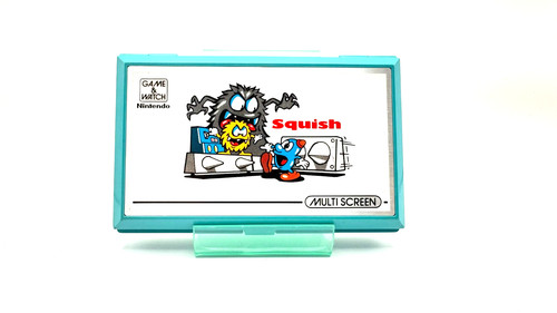Nintendo game watch squish - &,