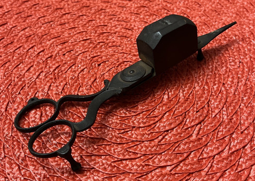 Antica candela snuffer