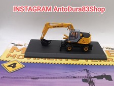 Escavatore gommato New Holland