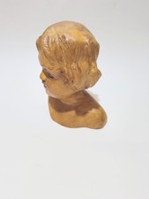 Testa in legno, scultura a