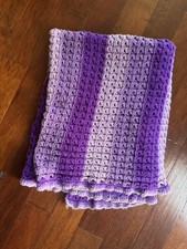 Crochet blanket with a striped