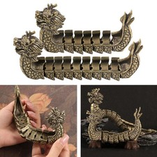 Statua di barca drago in