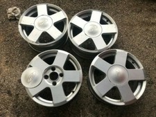 cerchi in lega 15 originali Ford Fiesta 4 fori 6J x 15 H2 ET 52,5 fusion borchie