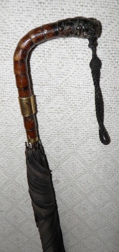 Antico ombrello nero - , pernice
