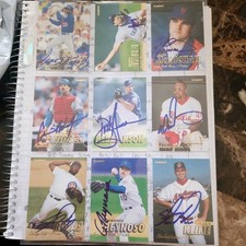 L o t of 9 autographed 1997 fleer cards