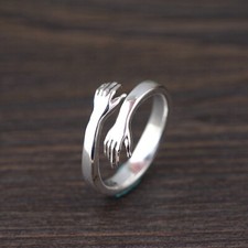Anello uomo abbraccio argento