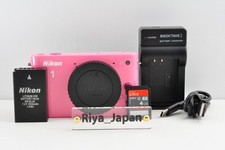 Corpo fotocamera digitale Nikon 1 J1 rosa - quasi come nuova - testata - numero di otturatori 2203