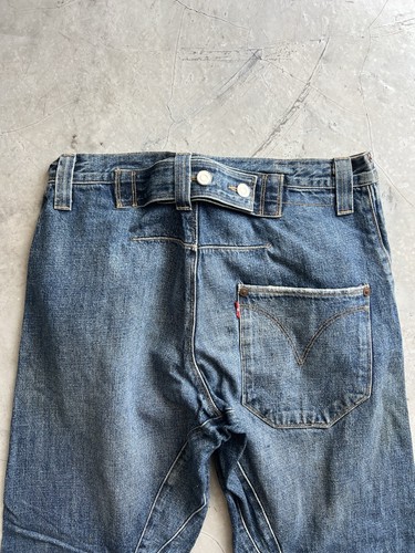 Fibbia jeans intrecciata