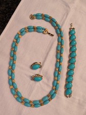  Collana, orecchini, bracciale