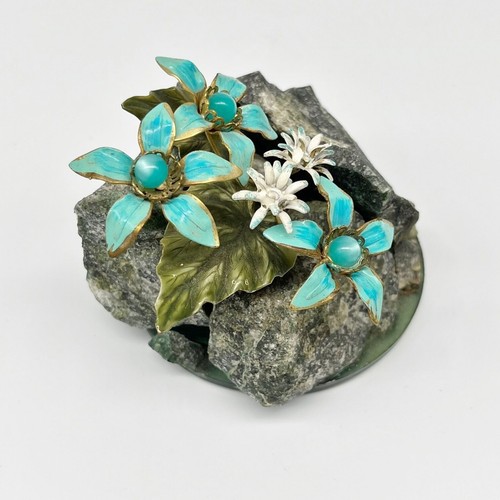 Scultura floreale smaltata