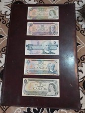 5 Banconote di Dollari Canadesi da 20,10,5 e un dollaro ( occasione )