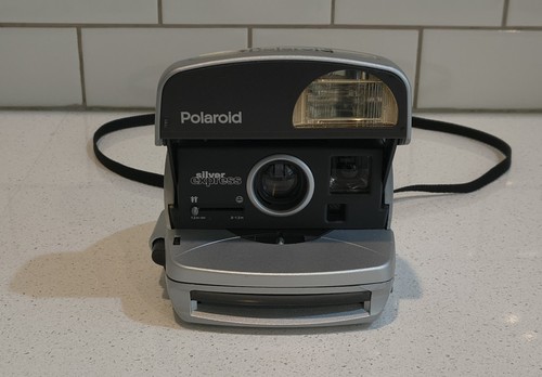 Polaroid 600 one - 600, step