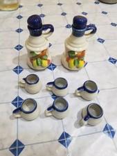 SERVIZIO IN PORCELLANA CON 6 MINI BICCHIERINI