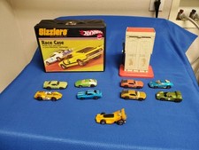 Pacchetto Hot Wheels Sizzlers 1969 vintage, custodia, caricabatterie e auto Redline