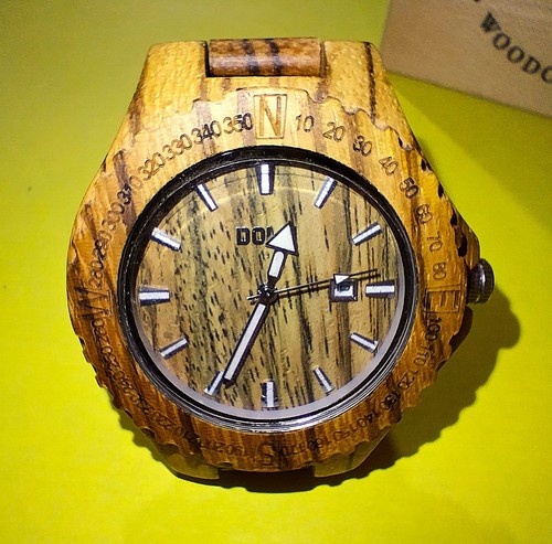 Orologio legno ulivo - in,
