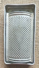 Grattugia formaggio curva