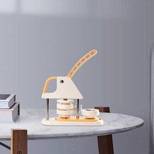 Macchina per creare spille per