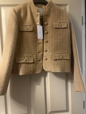 Giacca in tweed con dettagli