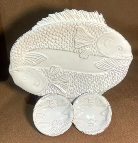 Set piatti pesce fango torta
