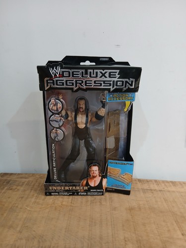 Wwe wrestling figure deluxe - wwe,