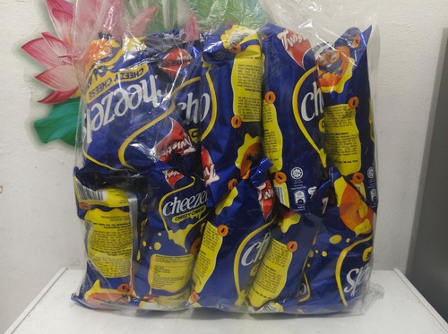 Twisties cheezels cheeezy - cheezels,