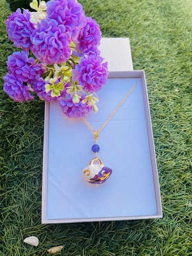 Collana con coffa decorata - con,