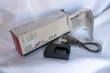 CASIO BC-60L CARICABATTERIE PER FOTOCAMERE. mai utilizzato