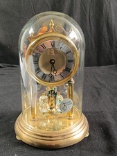 A4BC/PENDULE KUNDO SOUS CLOCHE
