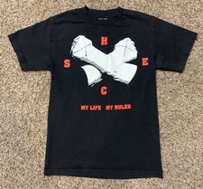 T-shirt nera CM Punk WWE X