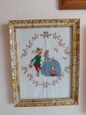 Quadretto ricamato a punto croce su lino.