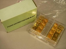 Distributore di corrente x auto a 4 vie con protezione fusibili x cavi da 7mm