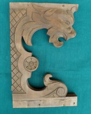 Fregio in legno intagliato con