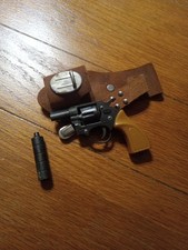 Revolver con tappo giocattolo