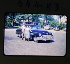 Man and Woman next to 1953