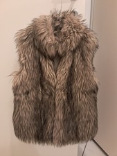 poncho cappotto pelliccia