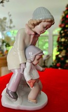 LLADRO YOU CAN DO IT FIGURINA