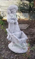 Statua bambina con carriola