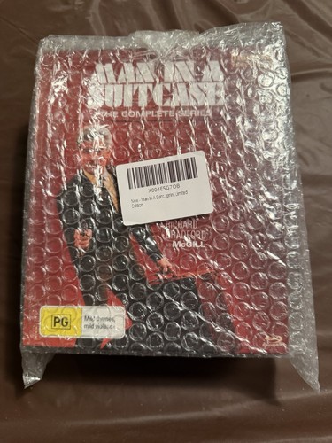 Man suitcase the - in,