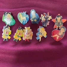 Set di 11 distintivi spilla