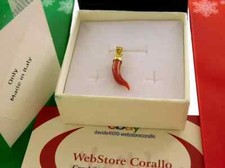 Ciondolo in corallo con oro 18 750 e corno pendente in pietra preziosa rossa da uomo