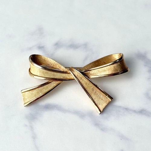 Spilla nastro oro trifari - spilla,