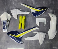 Plastiche + Grafica Husqvarna