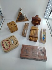 Grande lotto 78 giochi d'ingegno e rompicapo in legno ( e acciaio qualcuno) .