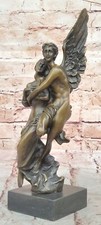 Scultura In Bronzo Di Cupido E
