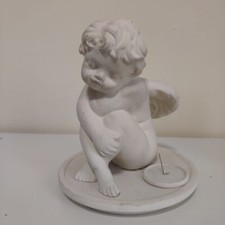 Angelo custode in resine con portacandela
