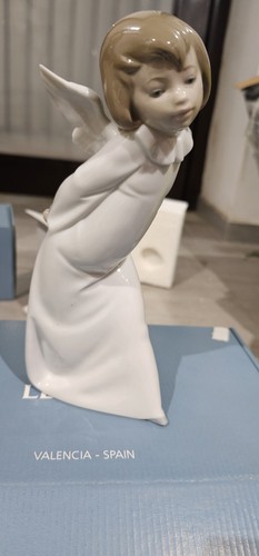 Lladro curious angel - lladro,