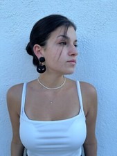 Orecchini SS20 Moschino Couture Jeremy Scott clip occhio di gatto pendente nero opaco