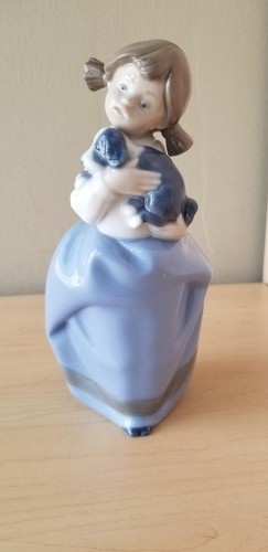 Lladro girl holding puppy - a,