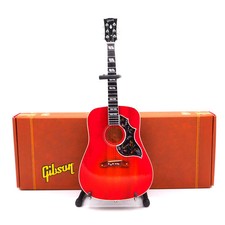 Axe Heaven Gibson Hummingbird